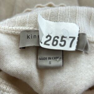 Kinross cashmere turtleneck sweater in size S. Light stain on left sleeve.